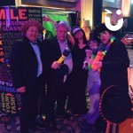 Photo Booth Being Enjoyed At A Corporate Evening Celebration