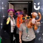 Photo Booth Being Enjoyed At A Corporate Event