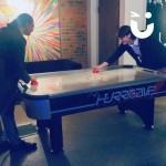 Air Hockey table Hire at an evening private party with 2 friends playing