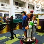 360 booth being enjoyed by colleagues and their families dressed in funny props