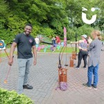 Soft Target Archery Hire Set up at an outdoor corporate event with colleagues taking aim