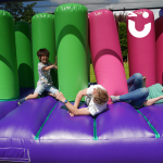 Three guests enjoying the Assault Course Pillars Bish Bash 
