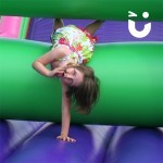 Young girl falloing through the Assault Course Mangle