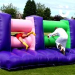 people iin fancy dress on our Assault Course Mangle during a team building event