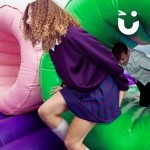 Assault Course Inflatable Tunnels 1 Hire at a school event with 2 students running through a tunnel
