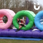 women in a rugby outfit at the Assault Course Tunnels