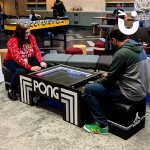 Our Atari Pong Table is a great way to relax in the office.