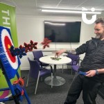 Axe Throwing Hire 5 being played on by a very excitied man 