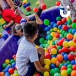 Children enjoying the Ball-Pool Hire during an Family Fun Day