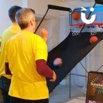 Basketball Hire 4 at an indoor corporate team build event with 2 men competing