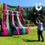 Basketball Inflatable Hire 1 set up at a university event with 2  students competing