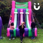 Basketball Inflatable Hire 3 outside at a corporate fun day with 3 people competing