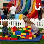 Mother and Child building together with our Big Rubber Lego Hire