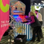 Bounce A Ball Hire set up at an exhibition with our Director Sunny competing against a man