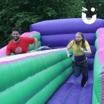A man giving it all hes got sprinting down the Bungee Run Hire