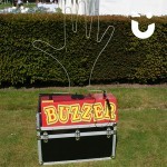 Our Hand Buzz wire Hire in red on display outside