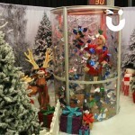 Christmas Cash Grabber Img set up at a Christmas event with an attendee catching bespoke foil wrappers 