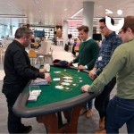 Blackjack Casino Table 2 Hire at a daytime office social with 3 men enjoying a game