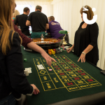 Guests choosing their numbers for the Roulette Roulette Casino Table Hire
