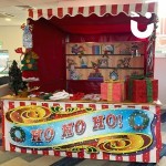 Elf On The Shelf Side Stall Hire set up and ready for some festive fun at a corporate event