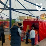 Christmas Funfair Hook a Duck stall being enjoyed at a family corporate event
