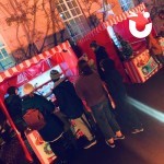 Festive Hook A Duck Outside aa night time Christmas Market