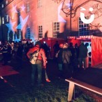 Row of festive stalls at a community event