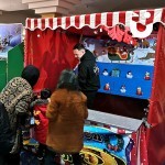 Our CHRISTMAS STALL HOOK A DUCK  backboard lit up in blue