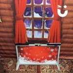 Christmas Snowman Buzz Wire Stood infornt of grotto backdrop