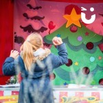 Christmas Target Tree Side Stall being used by a young girl at an outdoor event