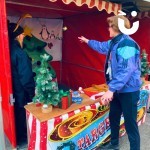 Christmas Target Tree Side Stall at a corporate festive event being enjoyed by a user