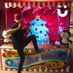 Christmas Target Tree Side Stall being played on by a man at a corporate party