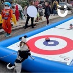 Curling Lane at a community event / street party with an interested dog and people in costumes
