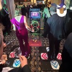 Dance Machine Red Rose Awards being used by 2 party goers