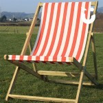 One of our red and white Giant Deckchair Hire