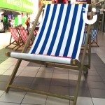 One of our Giant Deckchair Hire un blue and white stripes