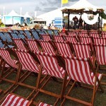 Deckchairs setup in front of a band stand