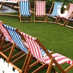 The Deckchair Hire in a semi circle for an outdoor corporate fun day