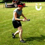 A young women at a team building event racing with our Egg And Spoon Hire