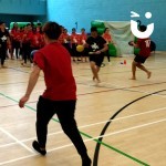 Children during an indoor sports day competing at the Egg And Spoon Hire
