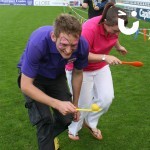A young man and women racing to the finish with our Egg And Spoon Hire