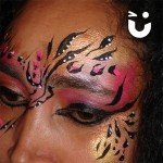 Girl with pink feathers from the Adult Face Painting Hire