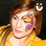 Girl with multi colourd eye from our Adult Face Painting Hire