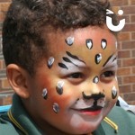 Young boy painted as a Leopard from our Face Painting Children Hire