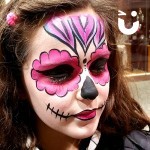 Young girl painted as a pink flower from the Face Painting Children Hire