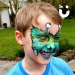 Our Face Painting Children Hire has painted a young boy as a little monster