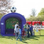 Guests lining up to use the Football Shoot Out Inflatable Hire