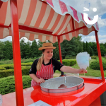 one of our fun experts handing out the candy floss