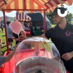Candy Floss Cart Hire 3 at a corporate fun day with a fun expert making fresh candy floss