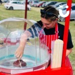 Candy Floss Cart Hire 6 at a corporate event with a fun expert making blue candy floss